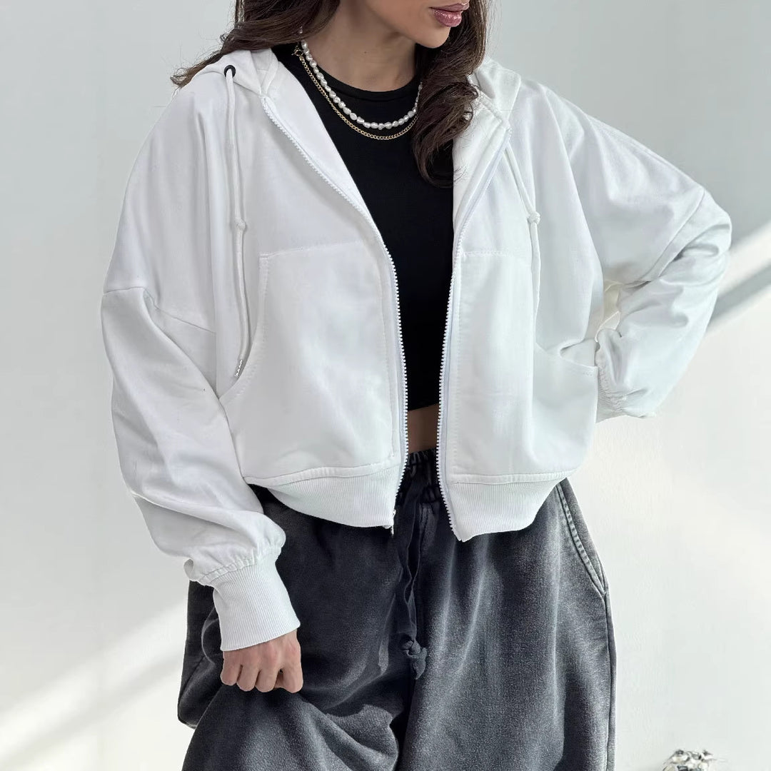 Kvinnors avslappnade zip hoodie med vida ärmar och praktiska fickor-Eva Jonsson