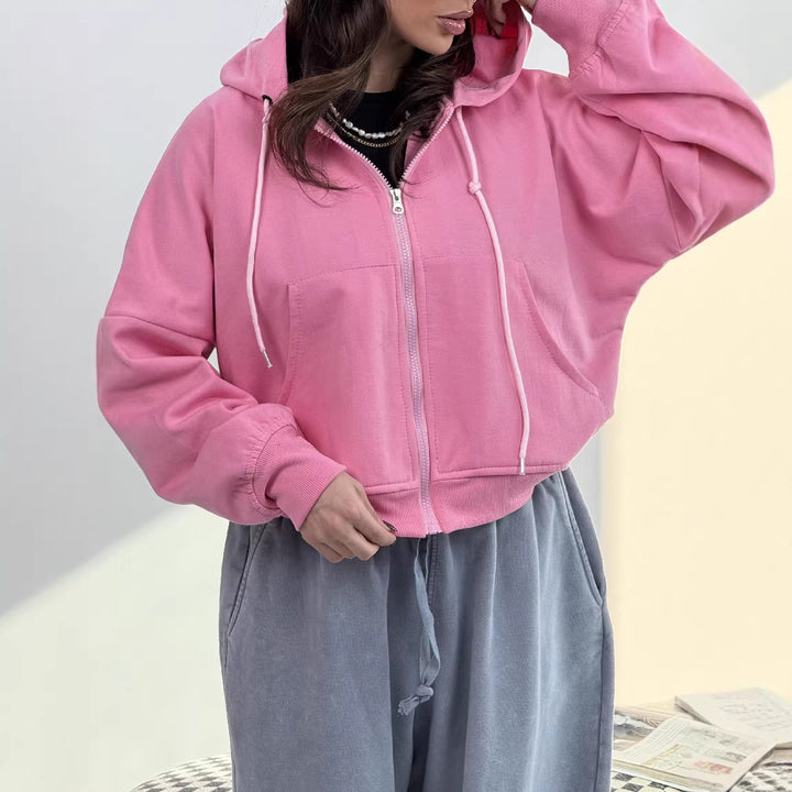 Kvinnors avslappnade zip hoodie med vida ärmar och praktiska fickor-Eva Jonsson