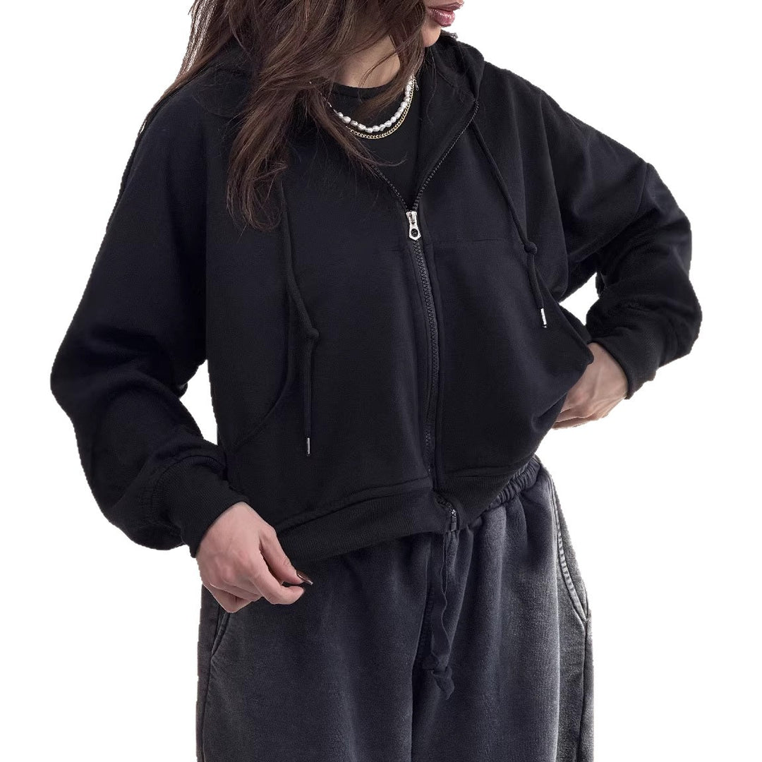 Kvinnors avslappnade zip hoodie med vida ärmar och praktiska fickor-Eva Jonsson