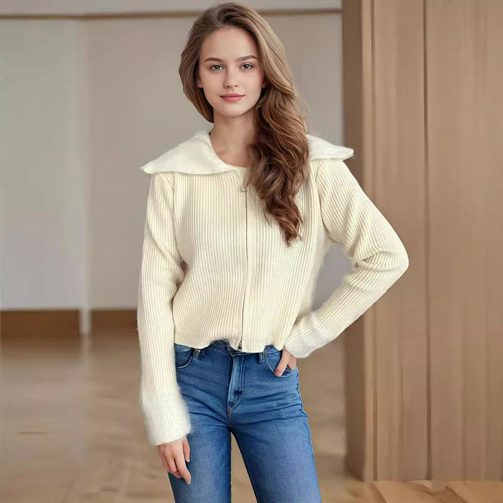 Kvinnors bekväma cardigan med praktiska dragkedjedetaljer och moderna puffärmar Mirla-Eva Jonsson