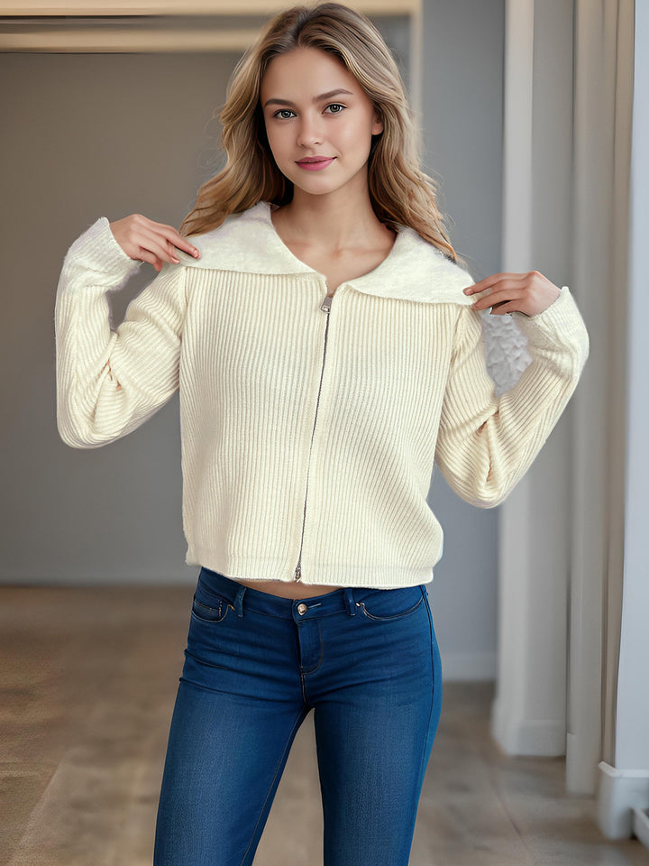 Kvinnors bekväma cardigan med praktiska dragkedjedetaljer och moderna puffärmar Mirla-Eva Jonsson