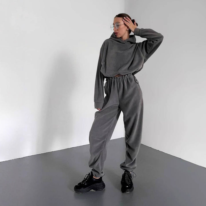 Kvinnors bekväma fleece jumpsuit med huva och elastisk midja-Eva Jonsson