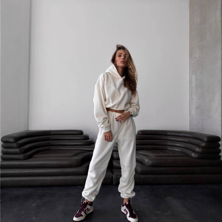 Kvinnors bekväma fleece jumpsuit med huva och elastisk midja-Eva Jonsson