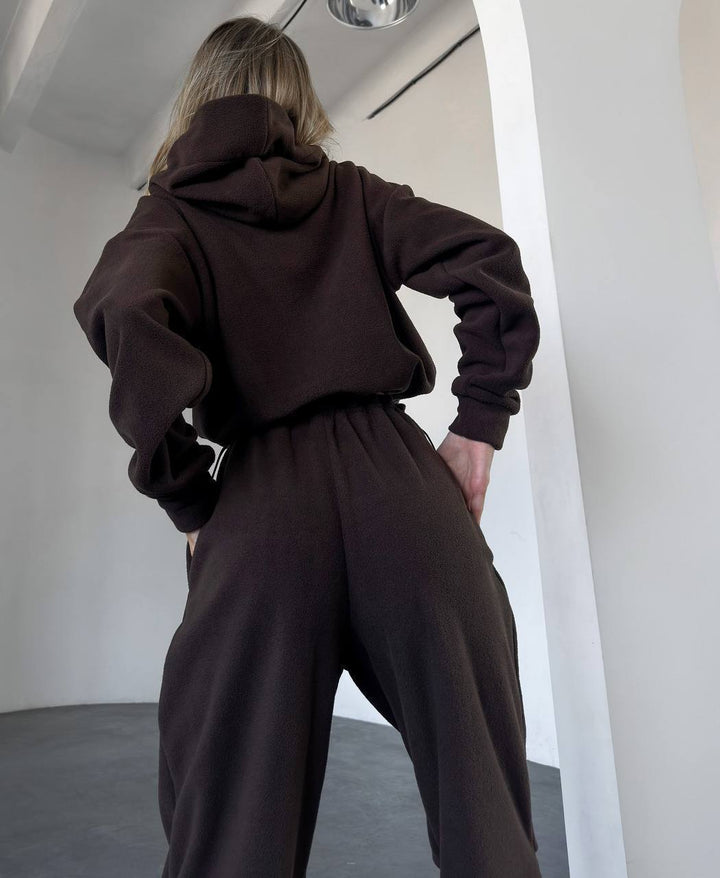 Kvinnors bekväma fleece jumpsuit med huva och elastisk midja-Eva Jonsson