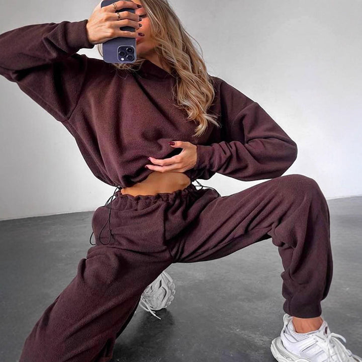 Kvinnors bekväma fleece jumpsuit med huva och elastisk midja-Eva Jonsson
