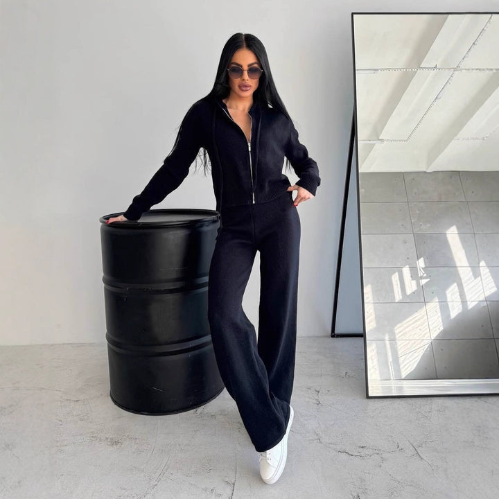 Kvinnors bekväma fleece jumpsuit med praktisk huva och dragkedja Mirla-Eva Jonsson