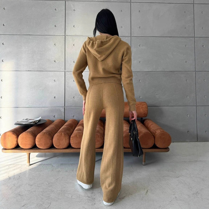 Kvinnors bekväma fleece jumpsuit med praktisk huva och dragkedja Mirla-Eva Jonsson