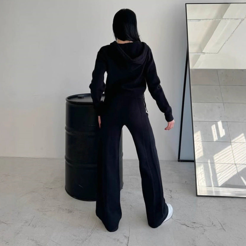 Kvinnors bekväma fleece jumpsuit med praktisk huva och dragkedja Mirla-Eva Jonsson