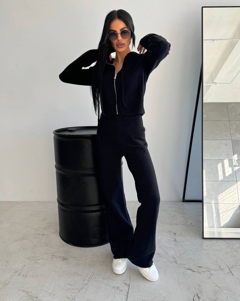 Kvinnors bekväma fleece jumpsuit med praktisk huva och dragkedja Mirla-Eva Jonsson