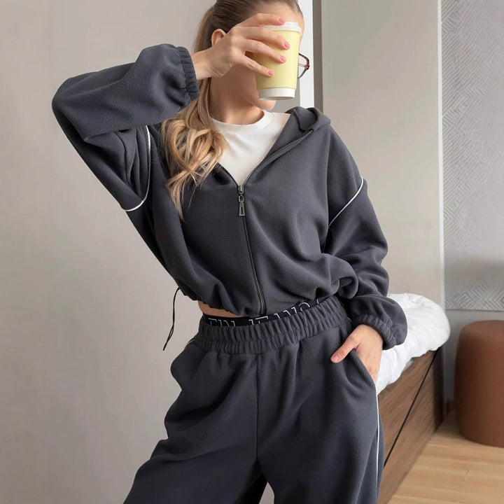 Kvinnors bekväma fleece träningsdräkt med hög krage och dragkedja Mirla-Eva Jonsson