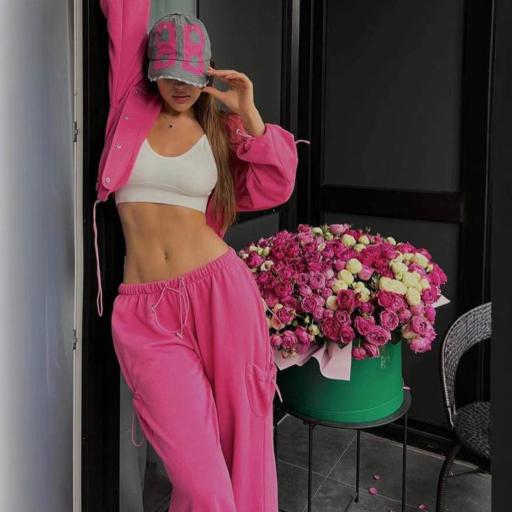 Kvinnors bekväma hoodie träningsoverall med praktiska dragsnören och knappdetaljer Mirla-Eva Jonsson