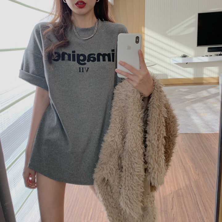 Kvinnors bekväma oversized T-shirt med kreativtryck och avslappnad skärning-Eva Jonsson