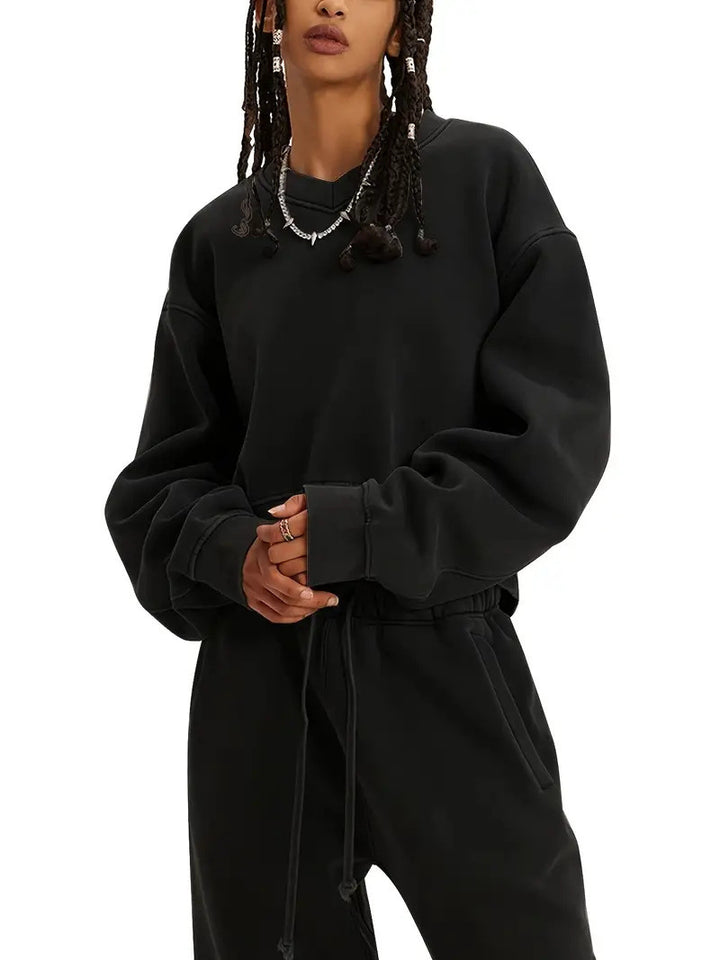 Kvinnors bekväma oversized tröja med en avslappnad passform och elastiska ärmar Mirla-Eva Jonsson
