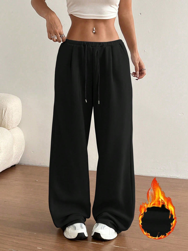 Kvinnors bekväma sweatpants med avslappnad passform och sidofickor Mirla-Eva Jonsson