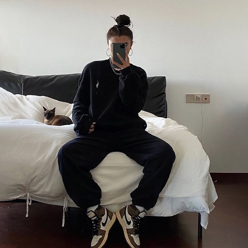 Kvinnors bekväma sweatshirt med praktiska fickor och elastisk midja Mirla-Eva Jonsson