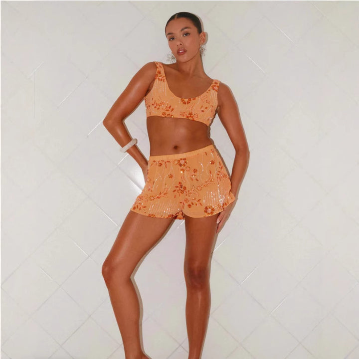 Kvinnors bikini-set med glittrande blommiga detaljer och figurnära skärning-Eva Jonsson