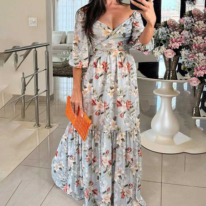Kvinnors blommig maxiklänning med off-shoulder design och volangkant Mirla-Eva Jonsson