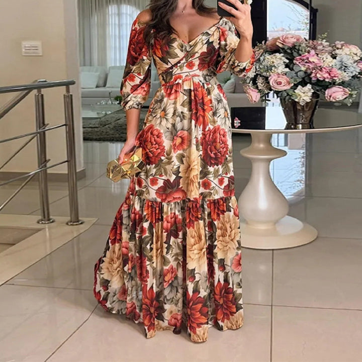 Kvinnors blommig maxiklänning med off-shoulder design och volangkant Mirla-Eva Jonsson