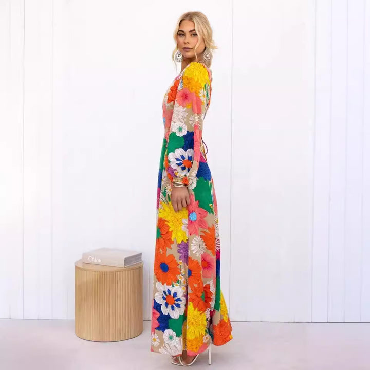 Kvinnors blommig maxiklänning med voluminösa ärmar och heltryckt blommönster Mirla-Eva Jonsson