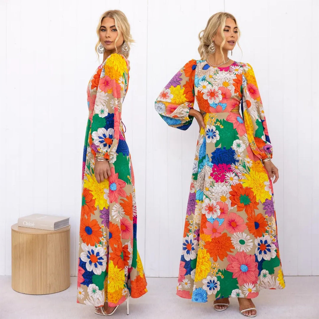 Kvinnors blommig maxiklänning med voluminösa ärmar och heltryckt blommönster Mirla-Eva Jonsson