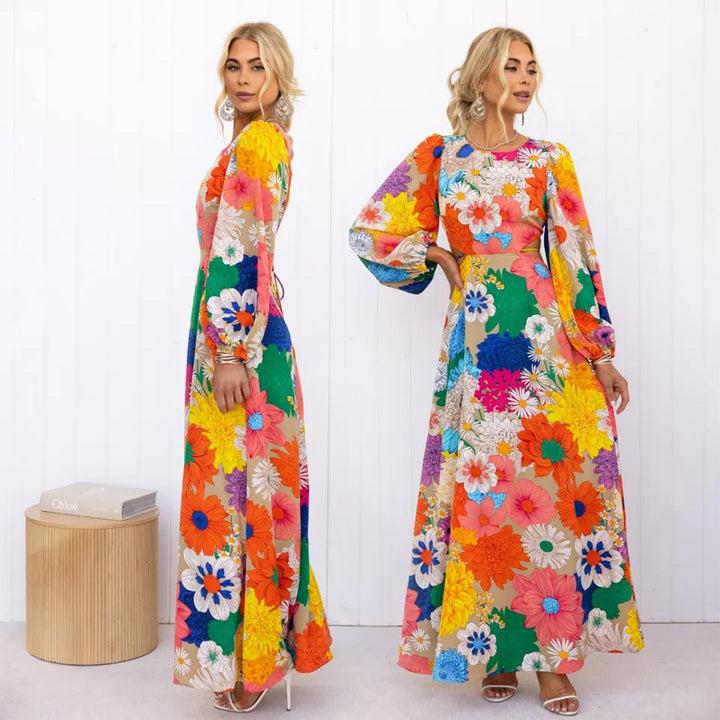 Kvinnors blommig maxiklänning med voluminösa ärmar och heltryckt blommönster Mirla-Eva Jonsson
