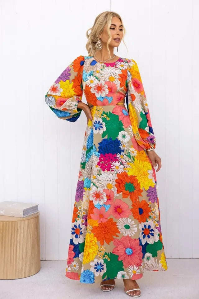 Kvinnors blommig maxiklänning med voluminösa ärmar och heltryckt blommönster Mirla-Eva Jonsson