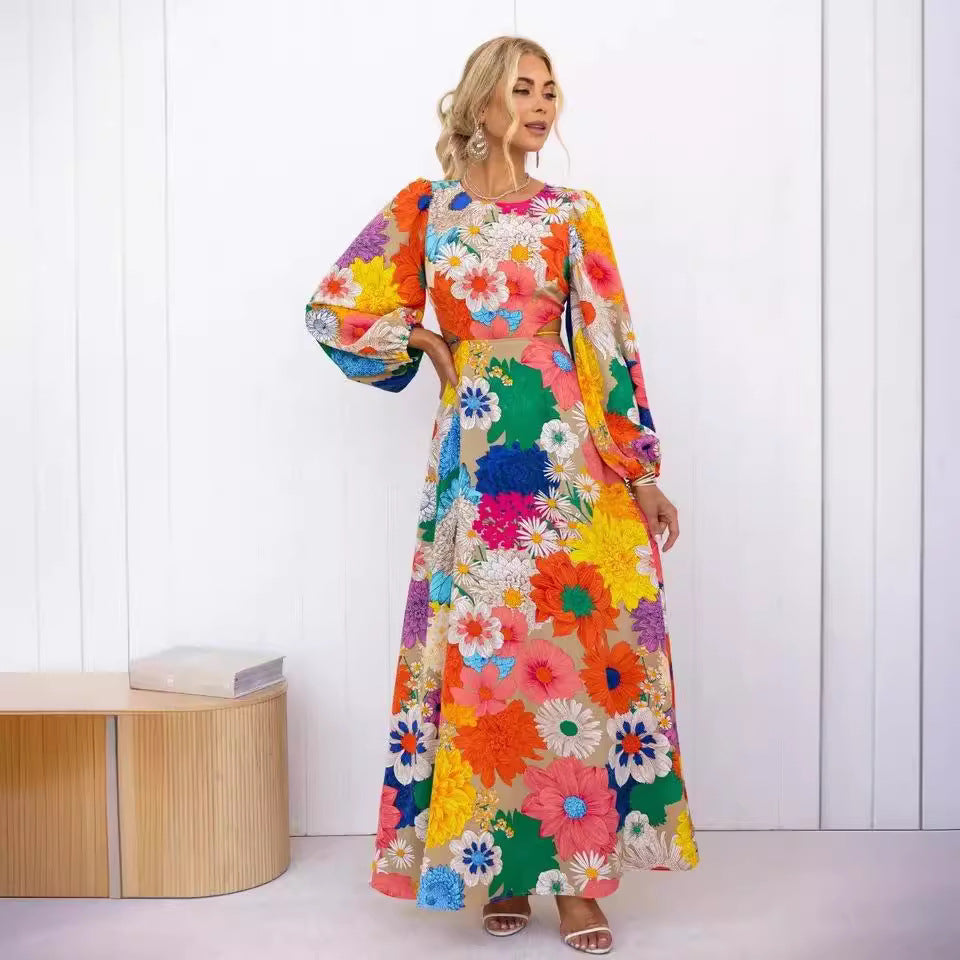 Kvinnors blommig maxiklänning med voluminösa ärmar och heltryckt blommönster Mirla-Eva Jonsson