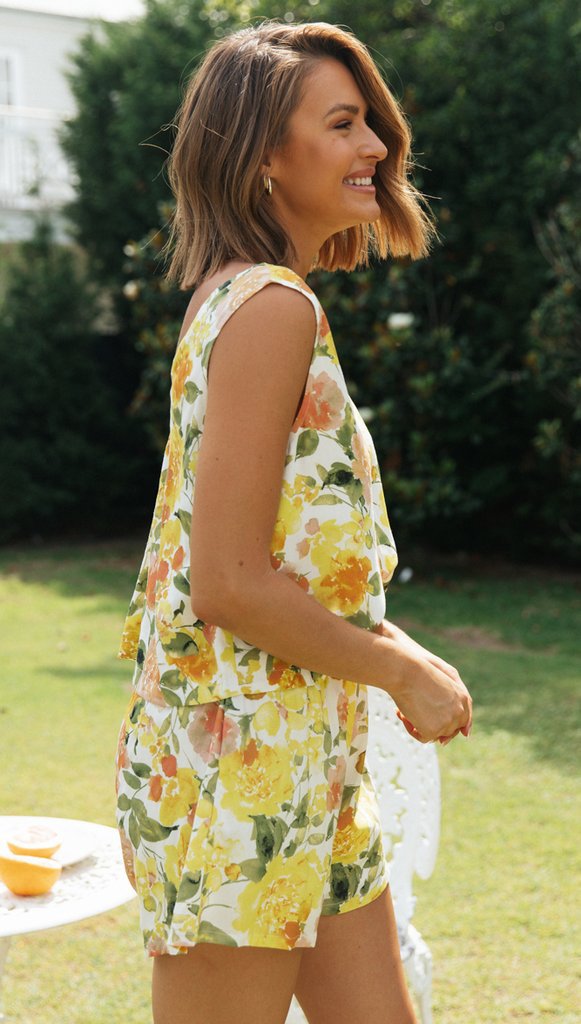 Kvinnors blommönstrad jumpsuit med V-hals och elastisk midja Mirla-Eva Jonsson
