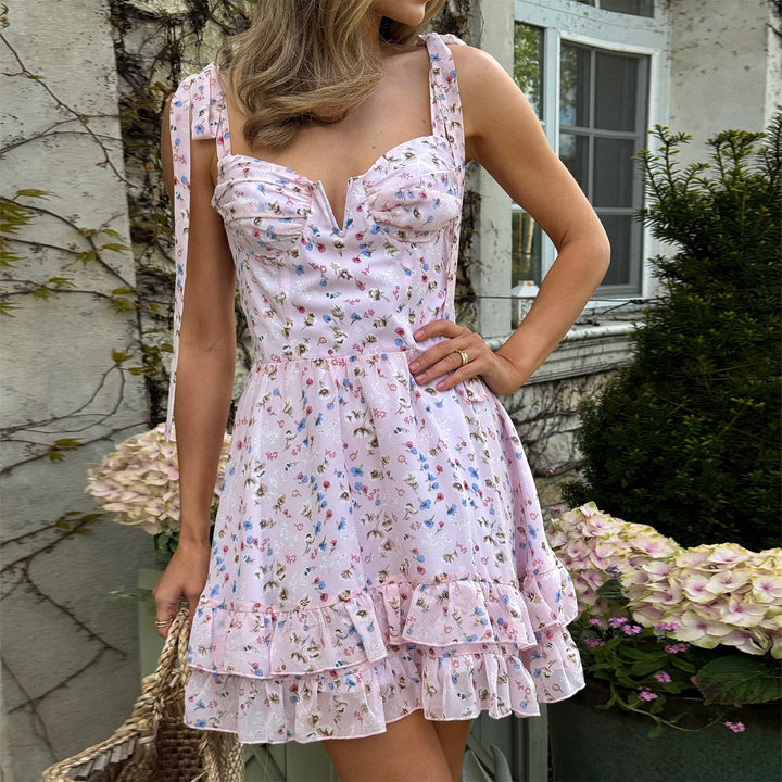 Kvinnors blomster mönster mini klänning med delikata volang detaljer och justerbara remmar Mirla-Eva Jonsson