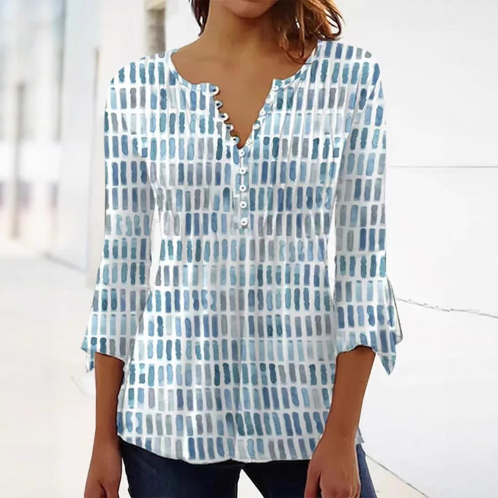 Kvinnors blus i modern grafisk design med knappp detaljer Mirla-Eva Jonsson