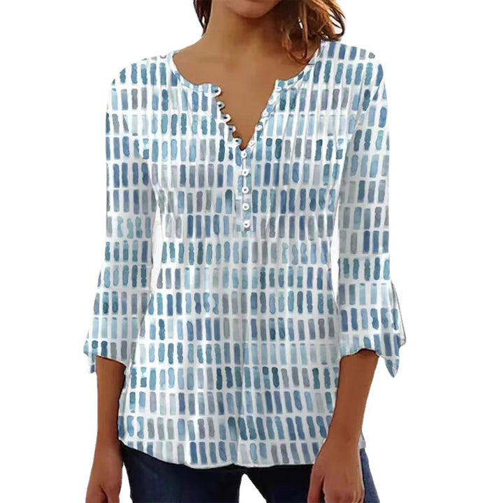 Kvinnors blus i modern grafisk design med knappp detaljer Mirla-Eva Jonsson