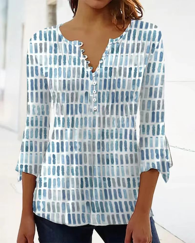 Kvinnors blus i modern grafisk design med knappp detaljer Mirla-Eva Jonsson