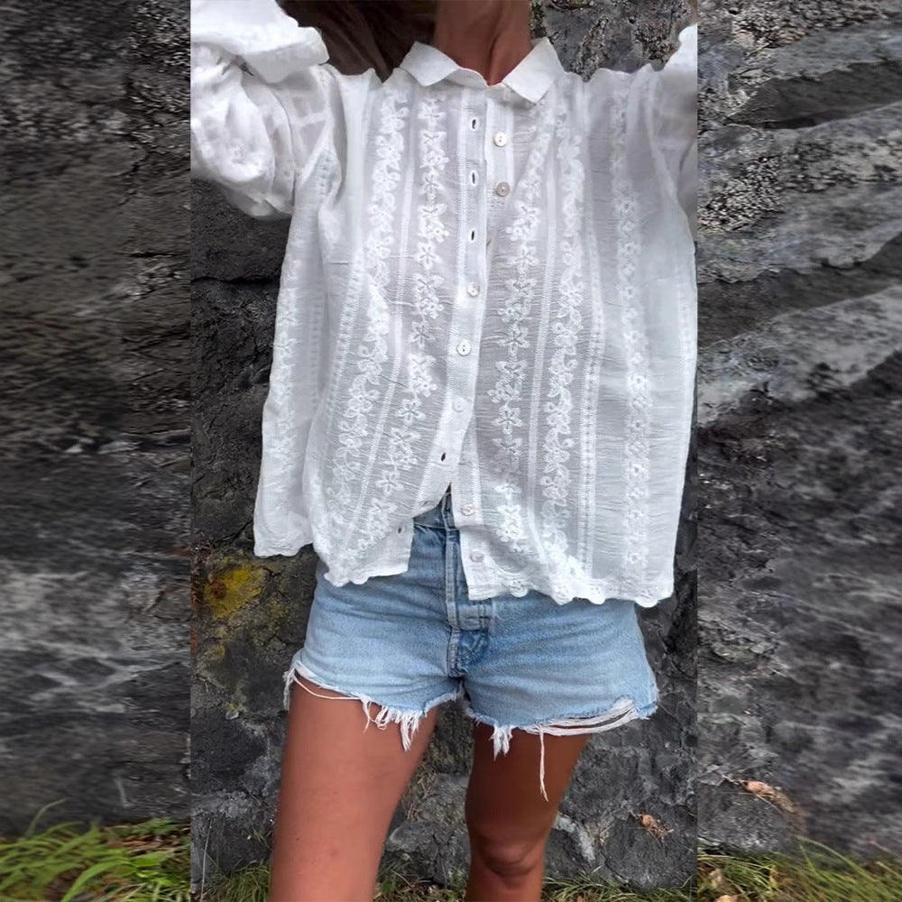 Kvinnors blus med blommig broderi och strukturerad tyg Mirla-Eva Jonsson
