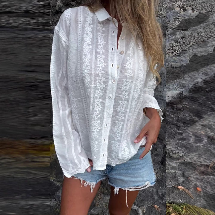 Kvinnors blus med blommig broderi och strukturerad tyg Mirla-Eva Jonsson
