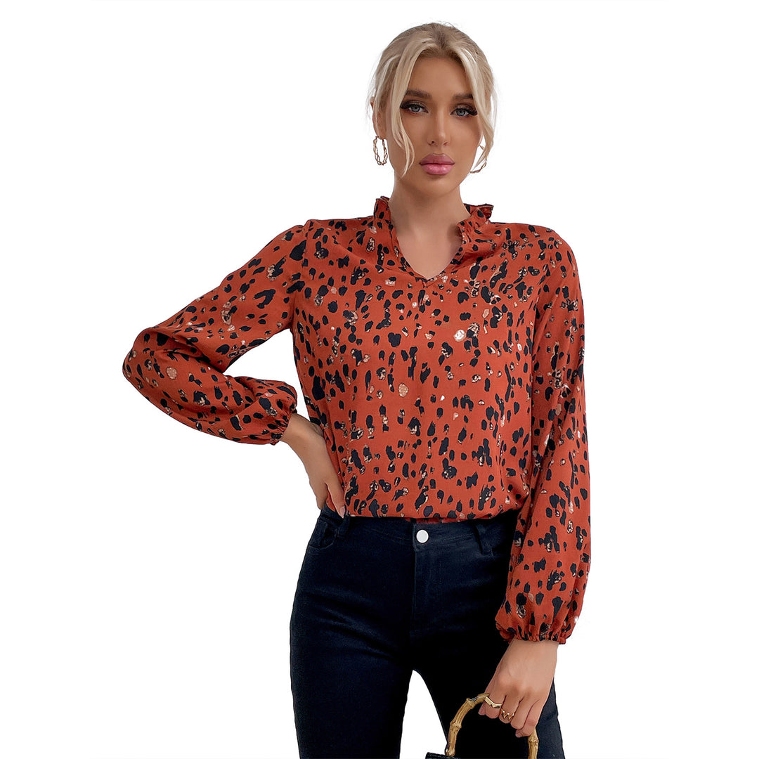 Kvinnors blus med blommig leopardmönster och voluminösa ärmar Mirla-Eva Jonsson