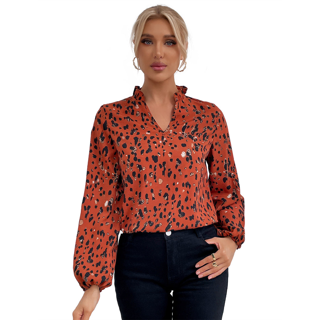 Kvinnors blus med blommig leopardmönster och voluminösa ärmar Mirla-Eva Jonsson