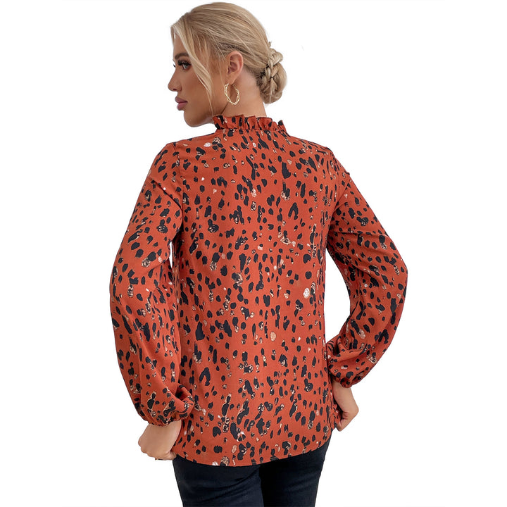 Kvinnors blus med blommig leopardmönster och voluminösa ärmar Mirla-Eva Jonsson