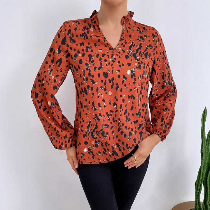 Kvinnors blus med blommig leopardmönster och voluminösa ärmar Mirla-Eva Jonsson