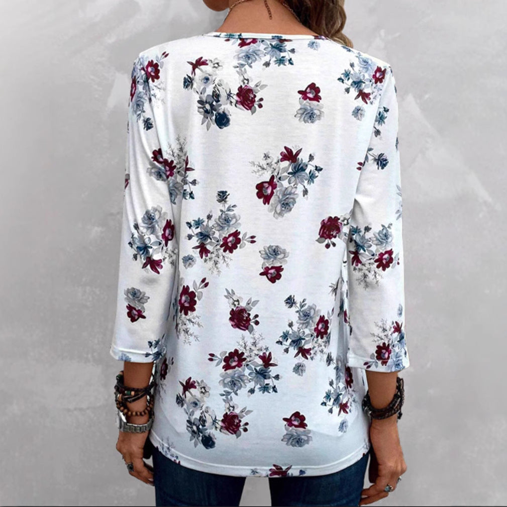 Kvinnors blus med blommönster och knappdetaljer Mirla-Eva Jonsson