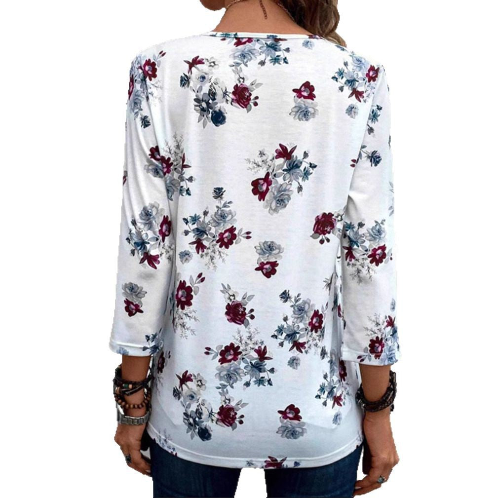 Kvinnors blus med blommönster och knappdetaljer Mirla-Eva Jonsson