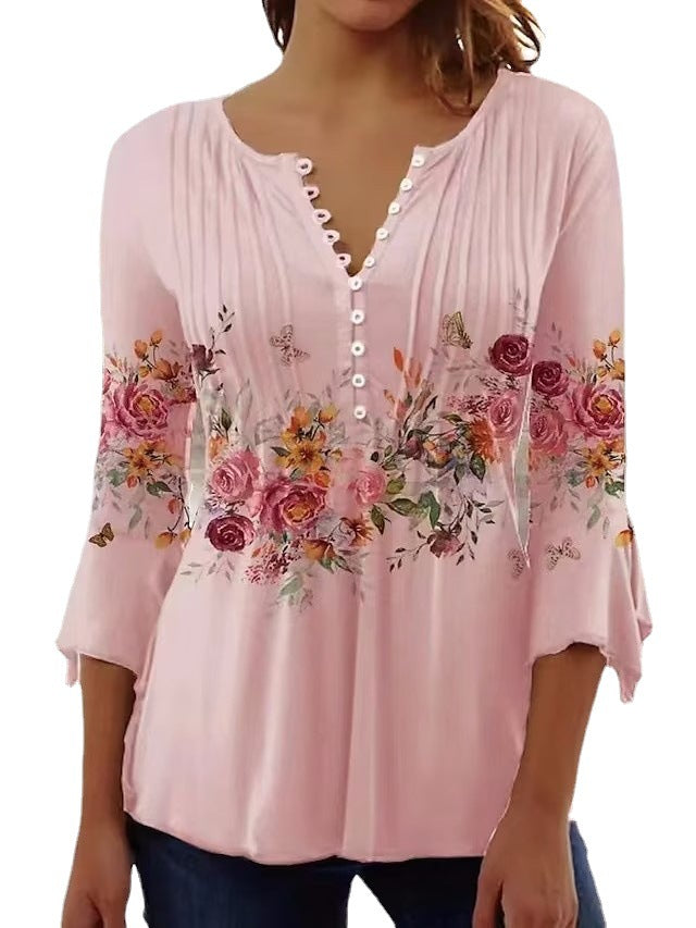 Kvinnors blus med blommönster och knappringning Mirla-Eva Jonsson