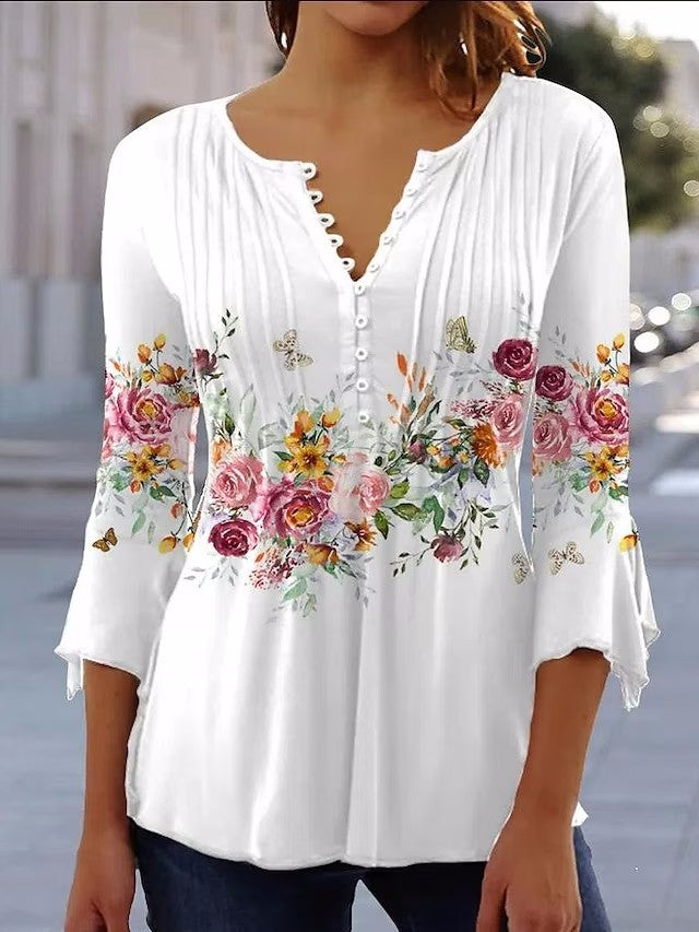 Kvinnors blus med blommönster och knappringning Mirla-Eva Jonsson