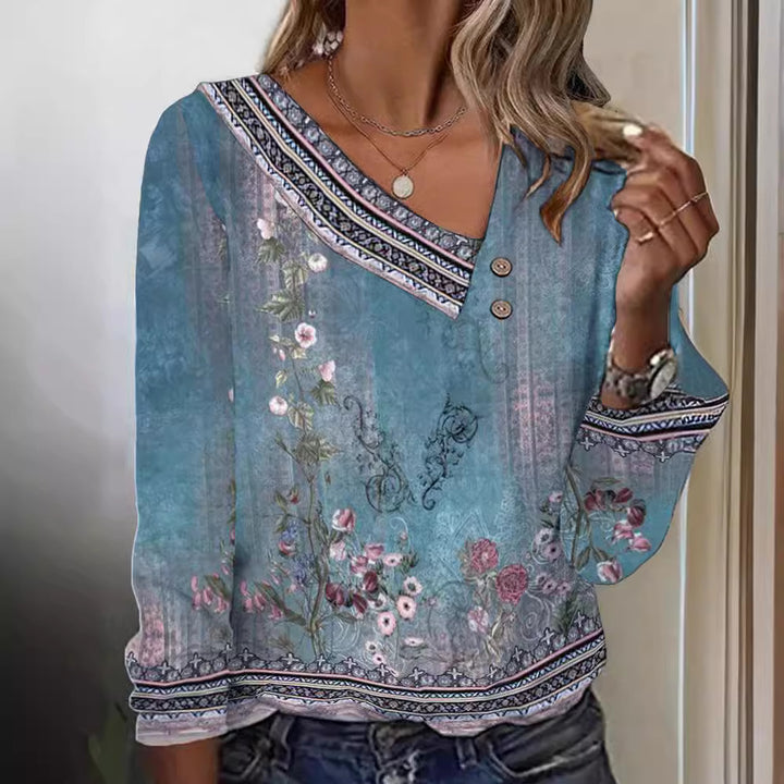 Kvinnors blus med blommönster och stilfull V-hals Mirla-Eva Jonsson