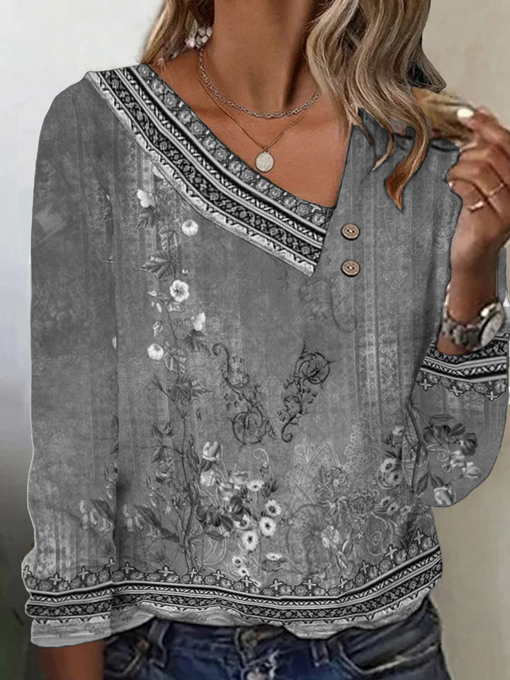 Kvinnors blus med blommönster och stilfull V-hals Mirla-Eva Jonsson