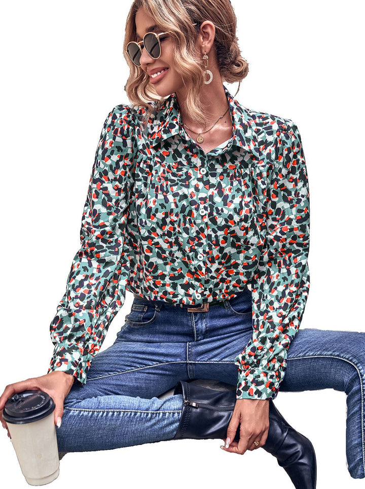 Kvinnors blus med blommönster och trendiga puffärmar Mirla-Eva Jonsson