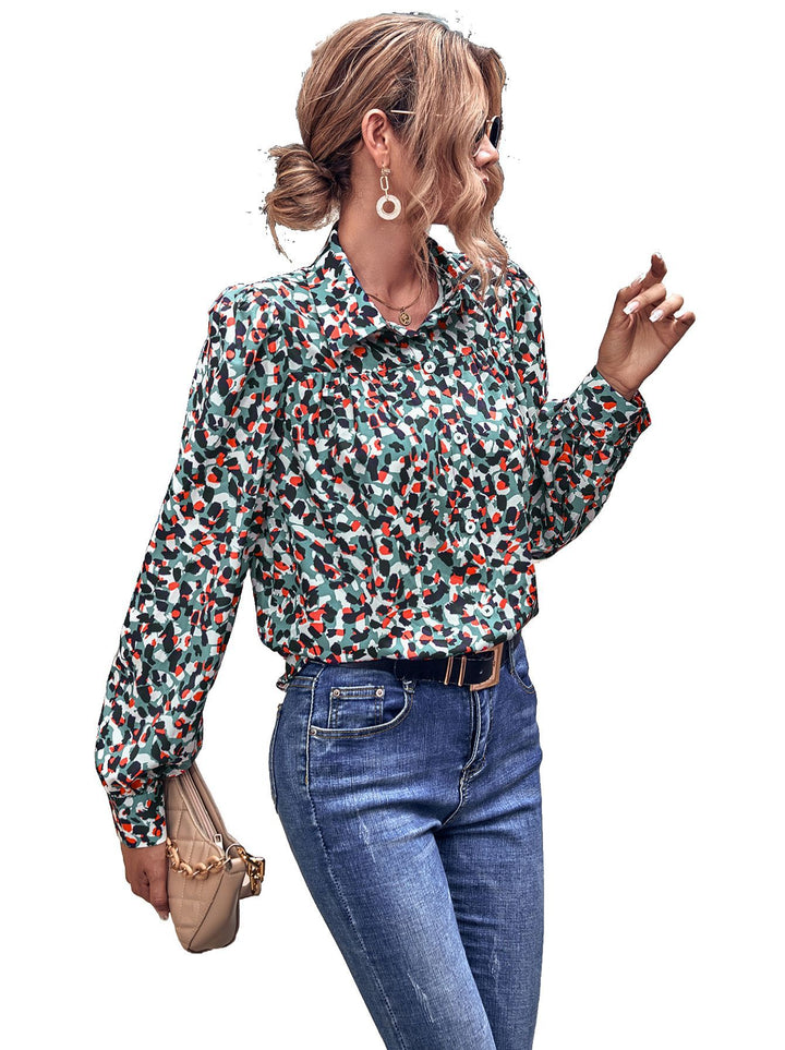 Kvinnors blus med blommönster och trendiga puffärmar Mirla-Eva Jonsson