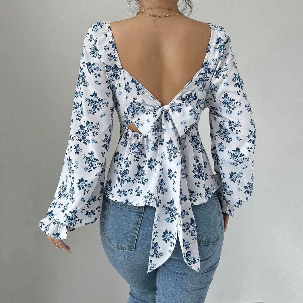 Kvinnors blus med blommönster och voluminösa ärmar Mirla-Eva Jonsson