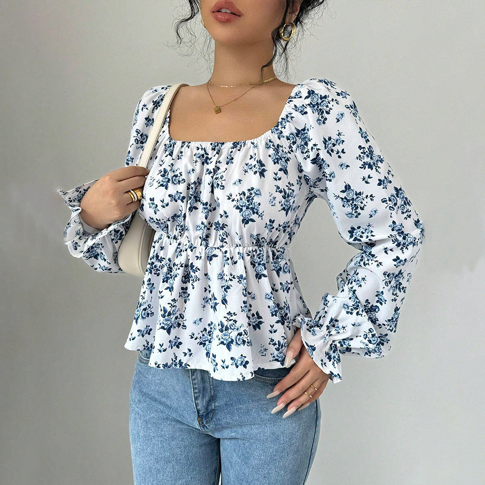 Kvinnors blus med blommönster och voluminösa ärmar Mirla-Eva Jonsson