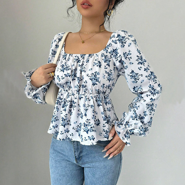 Kvinnors blus med blommönster och voluminösa ärmar Mirla-Eva Jonsson