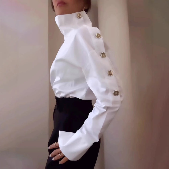 Kvinnors blus med eleganta knappdetaljer och hög krage Mirla-Eva Jonsson